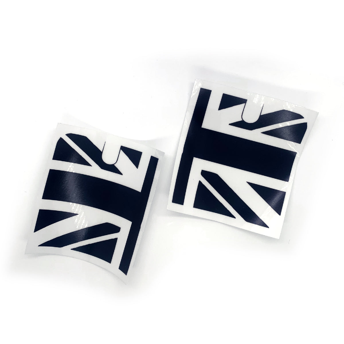 Deux adhésifs Union Jack noirs du kit Mini Austin MK2-3, présentés avant installation sur fond blanc
